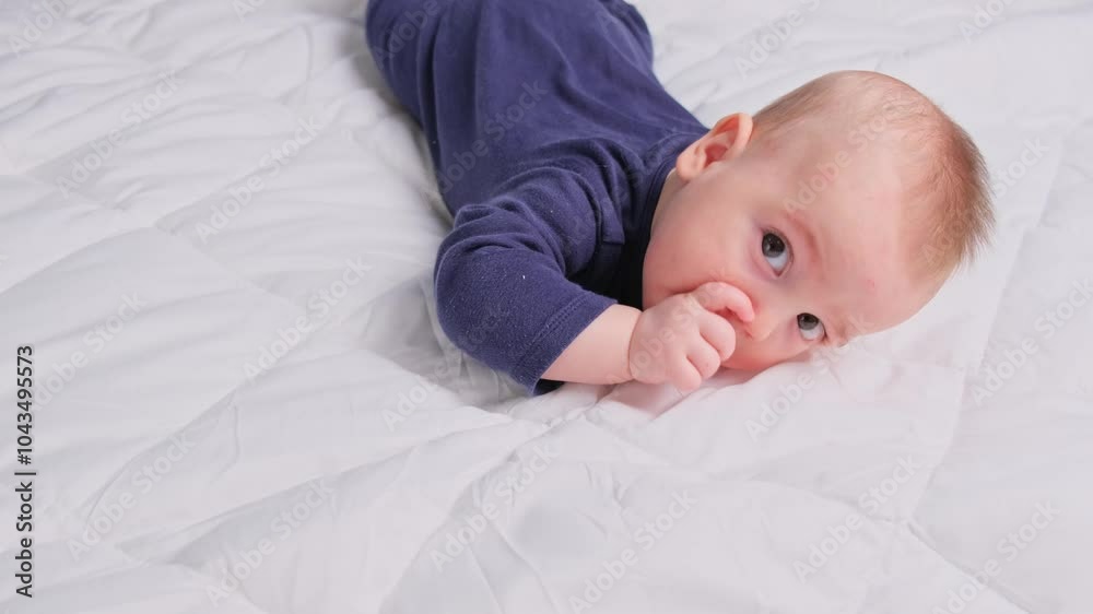thumb finger sucking infant young little baby boy children before sleep happy cute little boy thumb finger sucking infant young little baby boy children before sleep happy cute little boy