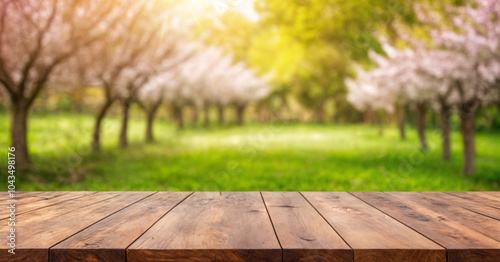 Top of wood table with pink cherry blossom flower on sky background - Empty ready for your product display or montage.