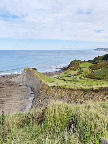 Playa De Sakoneta, The Sakoneta beach in Flysch Geopark, Basque country, Spain photo