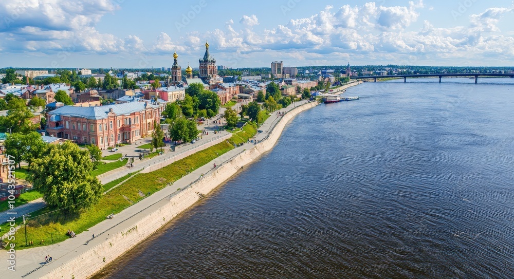 Obraz premium Aerial View of Rybinsk: Vibrant Cityscape with Volga River Embankment and Cathedral