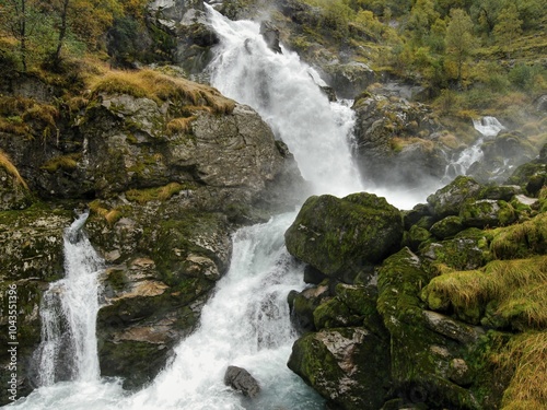 Waterfall in autumn Norwegian mountains. Long exposure time.