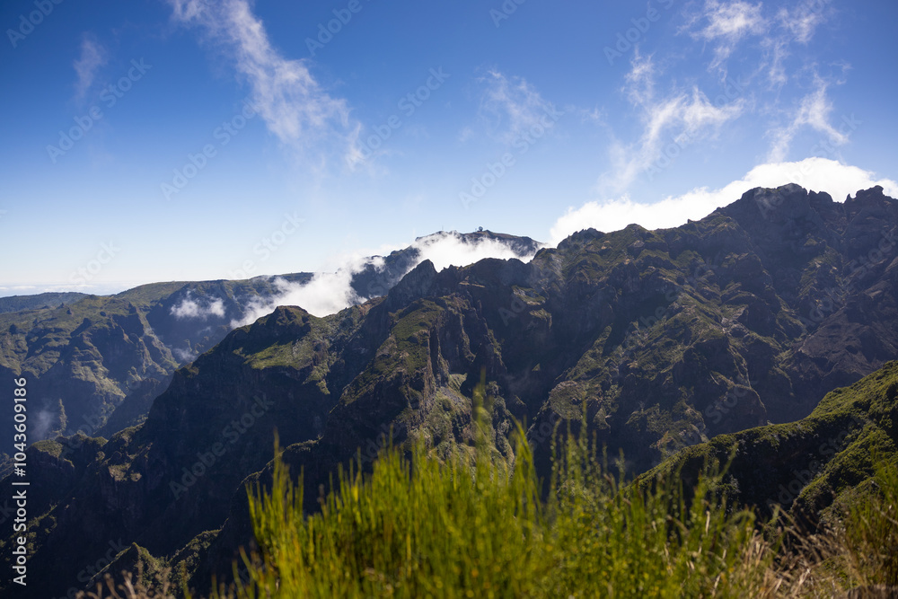 Mountains viewed from Pico Ruivo with the Pico do Areeiro at the background. Madeira island, Portugal Mountains viewed from Pico Ruivo with the Pico do Areeiro at the background. Madeira island, Portugal