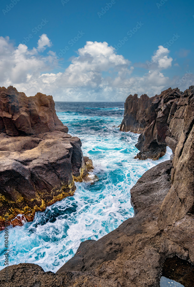 Stunning canyon made by eroded lava flows, Ponta da Ferraia on the north coast of São Miguel Island, Azores Islands, Portugal Stunning canyon made by eroded lava flows, Ponta da Ferraia on the north coast of São Miguel Island, Azores Islands, Portugal