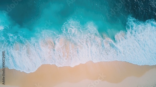 Tranquil vacation scene showcasing a stunning beach landscape with gentle waves and soft sand from a bird s eye perspective