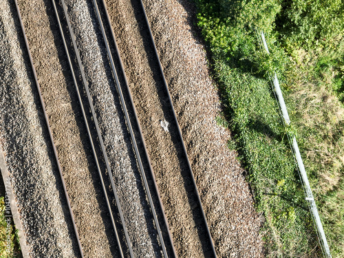 two railway tracks seen from directly above, drone view