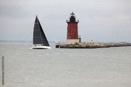 Wallpaper Mural Sailboat passing lighthouse Torontodigital.ca