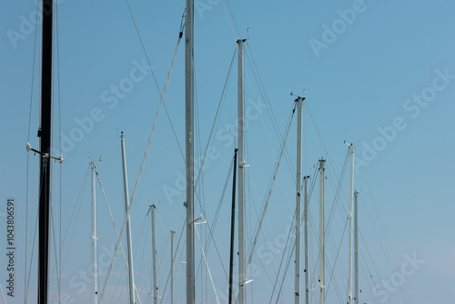 Sailboat masts lie in wait within the harbor, within Port Washington, Wisconsin harbor photo