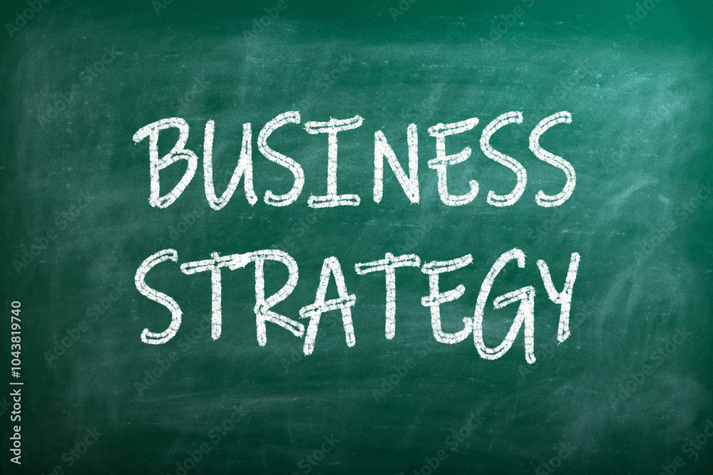 Close up of business strategy flow chart on blackboard. Close up of business strategy flow chart on blackboard.