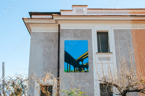 Photography House with image of elevated road in the Pigneto neighborhood of Rome