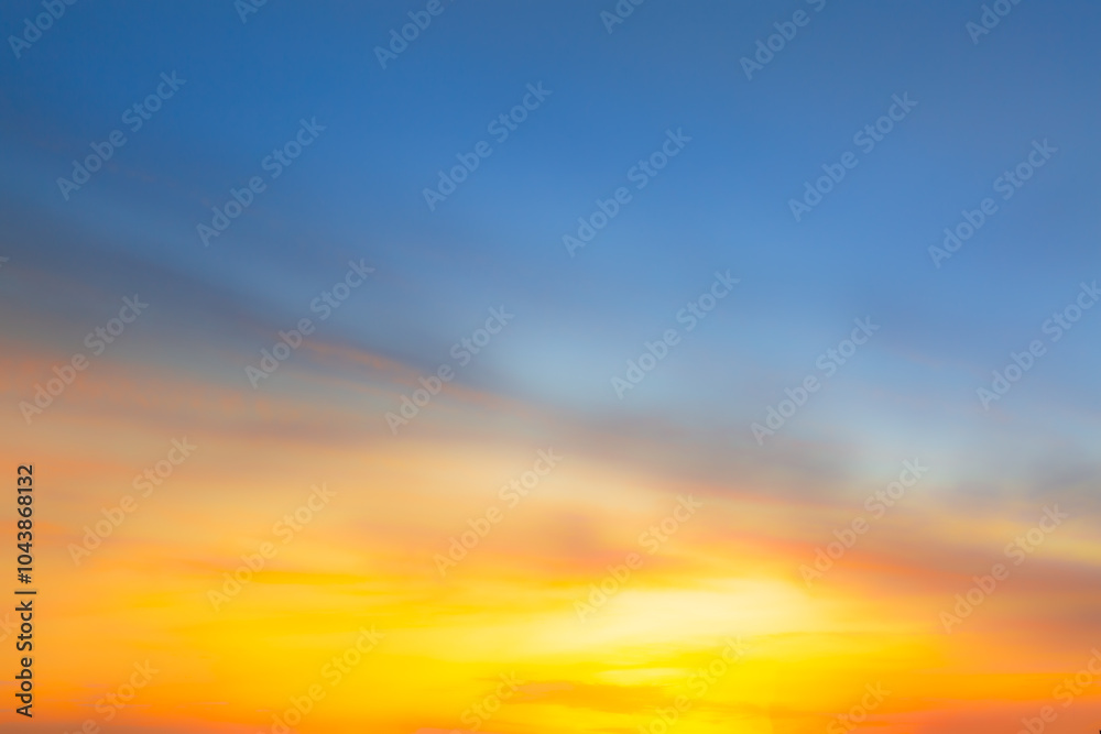 Fototapeta premium Clouds and sky background,Beautiful Vivid sky painted by the sun leaving bright golden shades