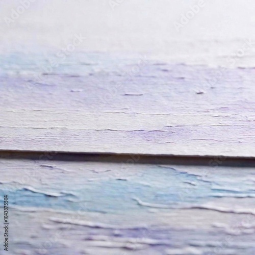 Deep Focus on Watercolor Paper: An eye-level shot of watercolor paper with visible texture from painting, in a studio setting, using deep focus to highlight the rough, textured surface and artistic