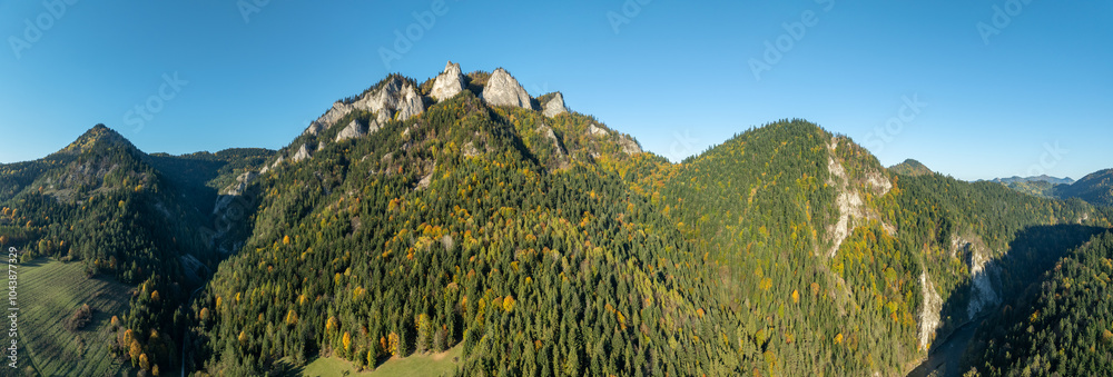 Poland. Pieniny Mountains in autumn with the highest summit Trzy Korony (Three Crowns), the beginning of Dunajec River Gorge on the right and Sobczanski ravine on the left . Wide aerial drone panorama
