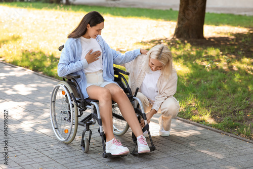 Senior woman helping her da...