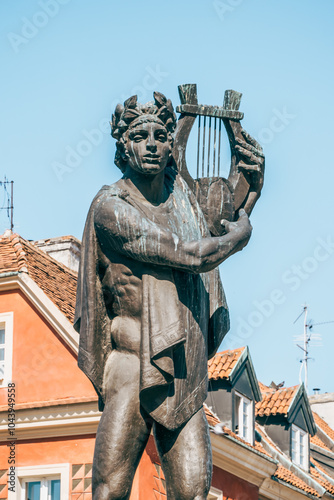 Historical Statue at Stary Rynek Square in Poznań, Poland, with a Beautiful Blue Sky