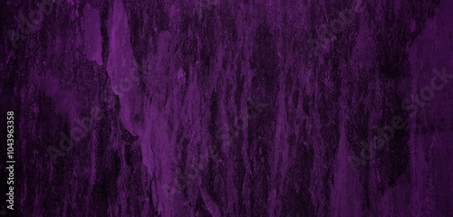 long background of purple color cracked wall with dark side,Peeling, cracked purple and blue rusty paint. Abstract textured background with rust spots.