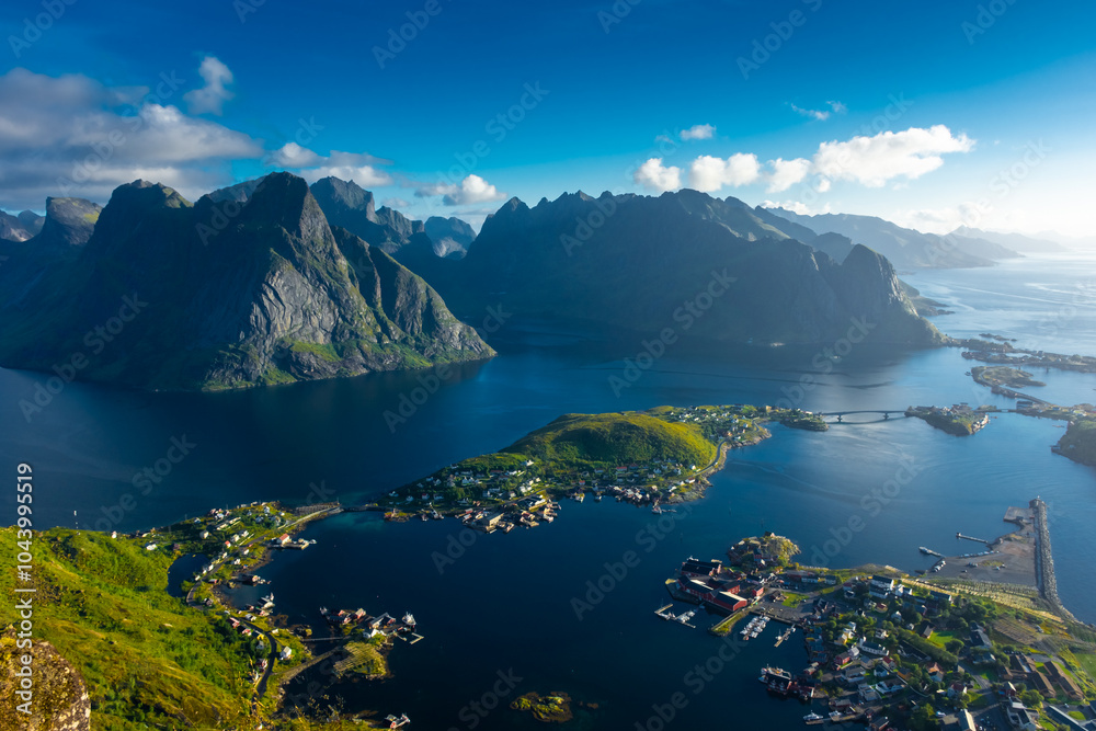 Amazing landscape of the Lofoten Islands from the top of Reinebringen Mountain with blue sky , Norway