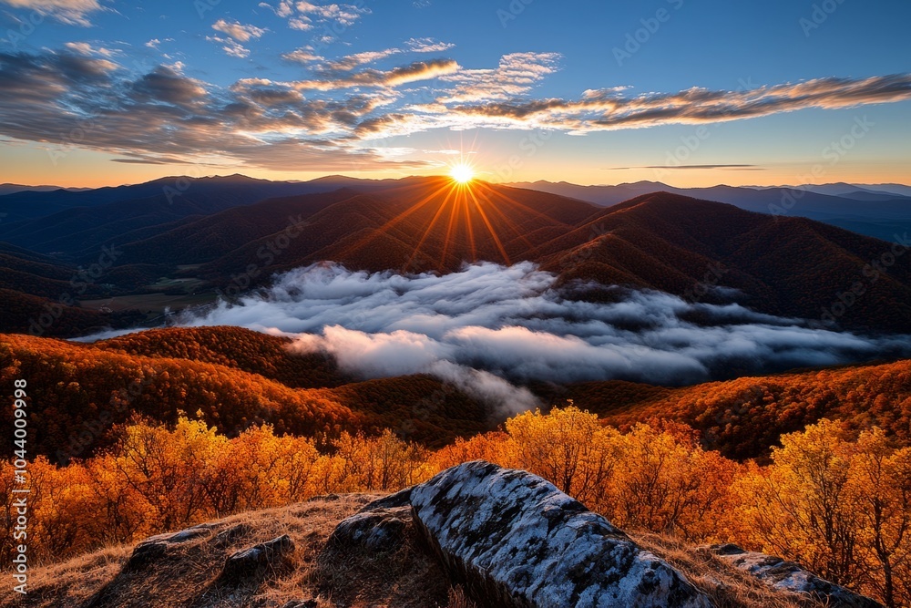 Obraz premium Sunrise over the Knuckles Mountain Range, with dramatic peaks bathed in golden light and clouds drifting below