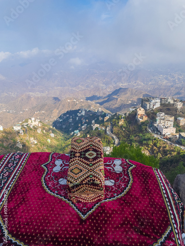 Prayer rug on the edge of a mountain at Jazan, Saudi Arabia photo