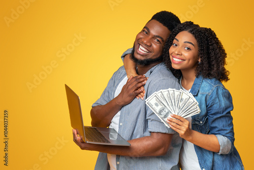 Wise Investment. Portrait Of Happy African Couple With Laptop And Dollar Cash In Hands
