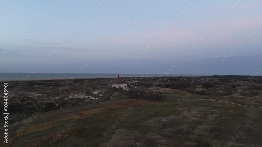 Schiermonnikoog Lighthouse Illuminated at Twilight Schiermonnikoog Lighthouse Illuminated at Twilight