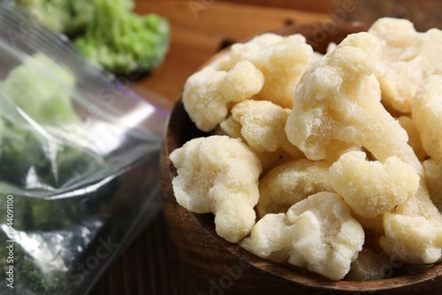 Frozen cauliflower in bowl on table, closeup