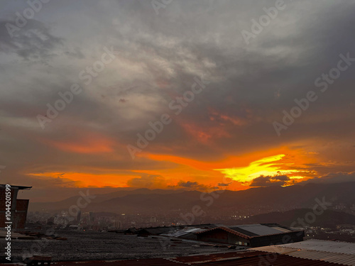 Beautiful orange sky background in the city. Medellin, Colombia. 