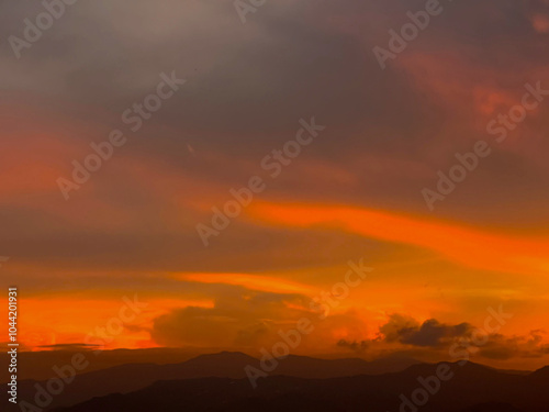 Beautiful orange sky background in the city. Medellin, Colombia. 