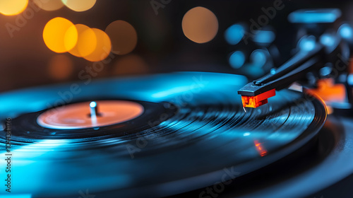 Close-up of a vinyl record spinning on a turntable with a blurred background of lights. photo