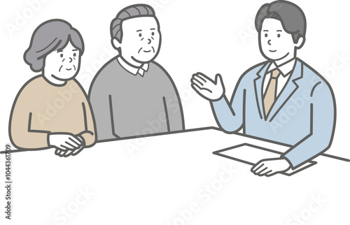 窓口で相談するシニア夫婦