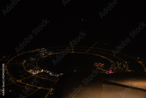 Shanghai - Aerial view of Dishui Lake and harbor at night photo