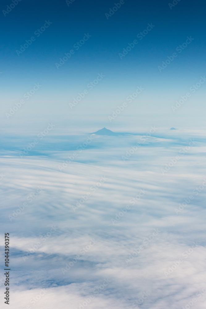 Fototapeta premium View from an airplane of the Kuril Islands and Sea of Okhotsk on a flight from Vancouver to Tokyo
