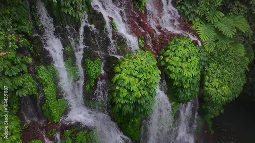 Banyu Wana Amertha Waterfall Bali, Indonesia. Tropical landscape. Beautiful hidden waterfall in rainforest photo