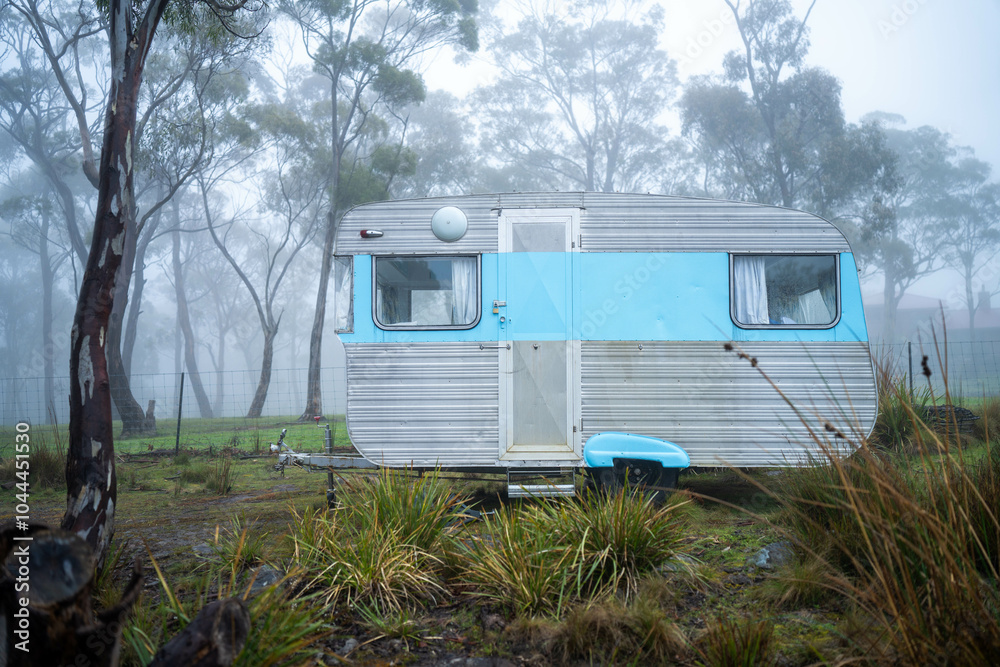 vintage Caravan camping at a campground off grid on a holiday in fog in ...