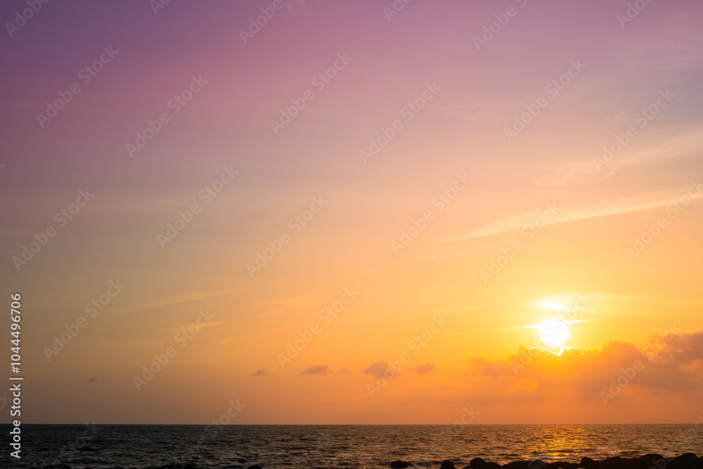 Fototapeta premium Enjoy a panoramic view of the skyline. The sun rises in the morning sky with colorful clouds. and beautiful cloud patterns In the soft light of the morning