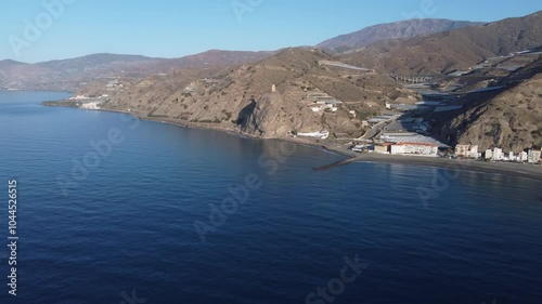 Aerial view of greenhouses by the sea, Andalusia, Spain photo