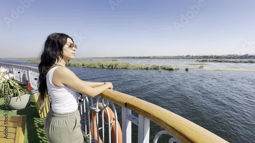 Woman becoming a Nile nomad and experiencing the rhythm of the river. As a woman on this cruise, you will discover the beauty and tranquility of the Nile, and feel a deep connection to ancient Egypt.