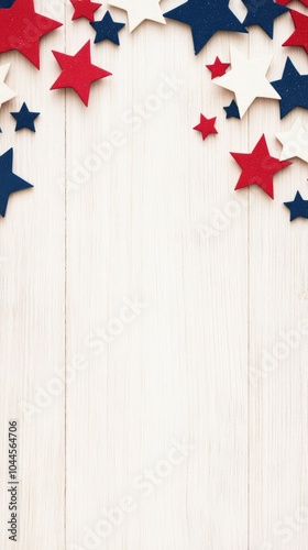 american independent day concept, red, white, and blue stars on white wooden surface with copyspace