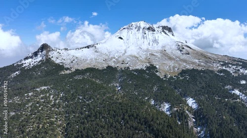 Aerial video of one of the main mountains in Mexico covered in snow after a rare storm photo