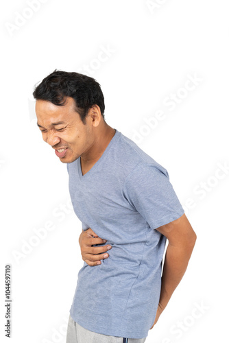 A man holding his stomach with a pained expression, indicating discomfort or abdominal pain, set against a white background.