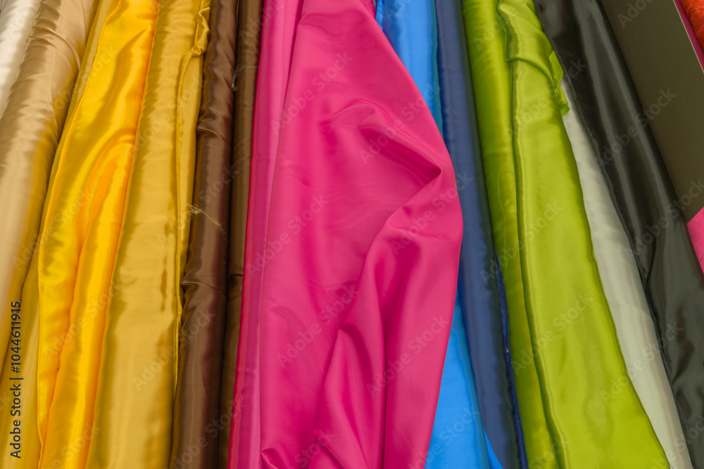 colorful linen many fabric rolls background colorful linen many fabric rolls background