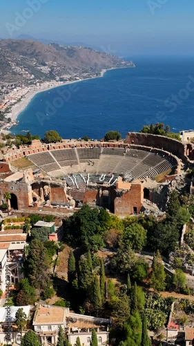 Ancient Theater of Taormina in Sicily, Italy.
Spectacular aerial view of the Greek Amphitheater, tourist attraction for foreign visitors. Sicilia, Italia.