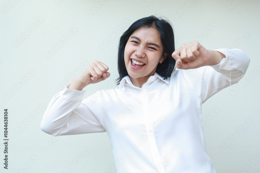 ecstatic asian business woman raising fist showing yes gesture, celebrating champion victory, employee dancing and rejoicing, wearing white shirt formal suit isolated on white background ecstatic asian business woman raising fist showing yes gesture, celebrating champion victory, employee dancing and rejoicing, wearing white shirt formal suit isolated on white background