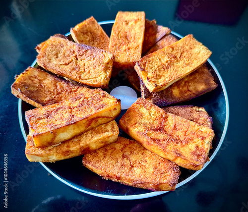 My own creation - a baked tofu appetizer or main course with a salad based on firm tofu basted in a sauce mix of my imagination - a yummy food option photo