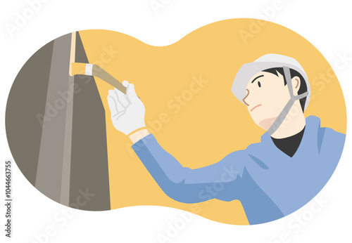 刷毛で塗る男性作業員