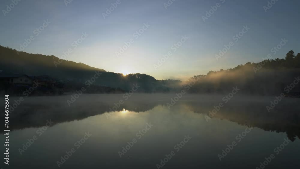 foggy with sunrise over the river foggy with sunrise over the river