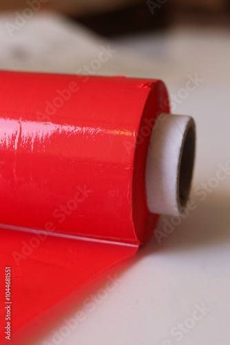 red stretch film for packing things and suitcases photo