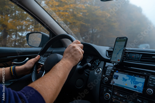 Obraz na płótnie Person Driving by the road at foggy autumn highway w salonie