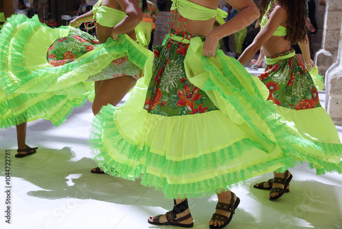 Dancers dancing and wearing one of the traditional folk costume from Brazil photo