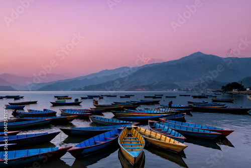 Fototapeta Naklejka Na Ścianę i Meble -  twilight with boats on Phewa lake, Pokhara, Nepal