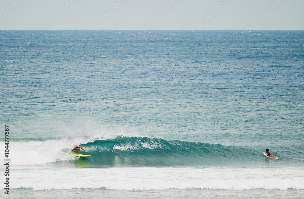 Surfer getting a barrel Surfer getting a barrel